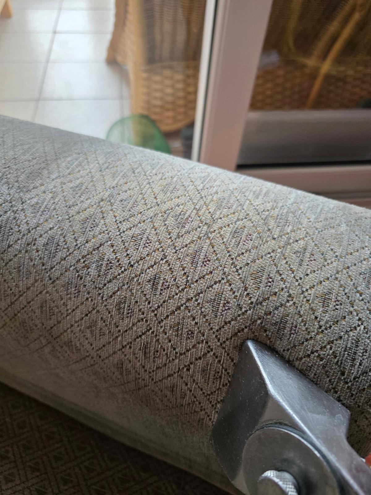 Professional upholstery extraction cleaning on fabric sofa